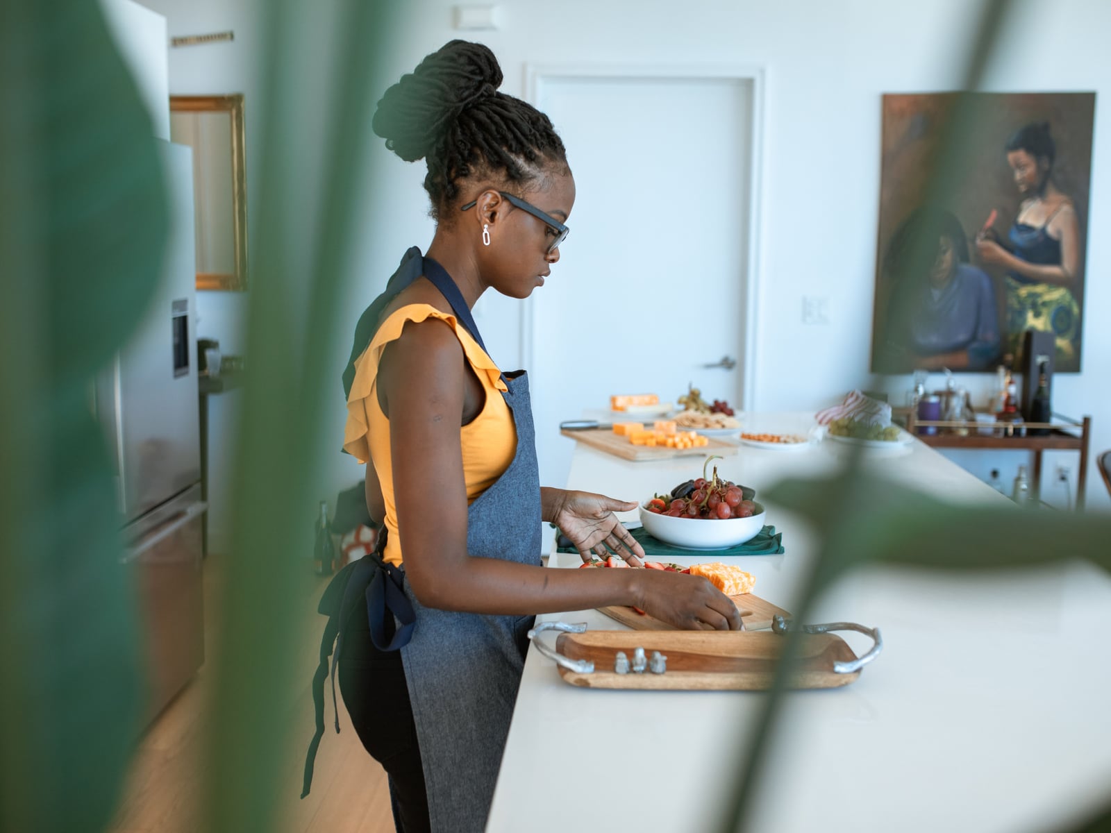 A home cook preparing food in her kitchen