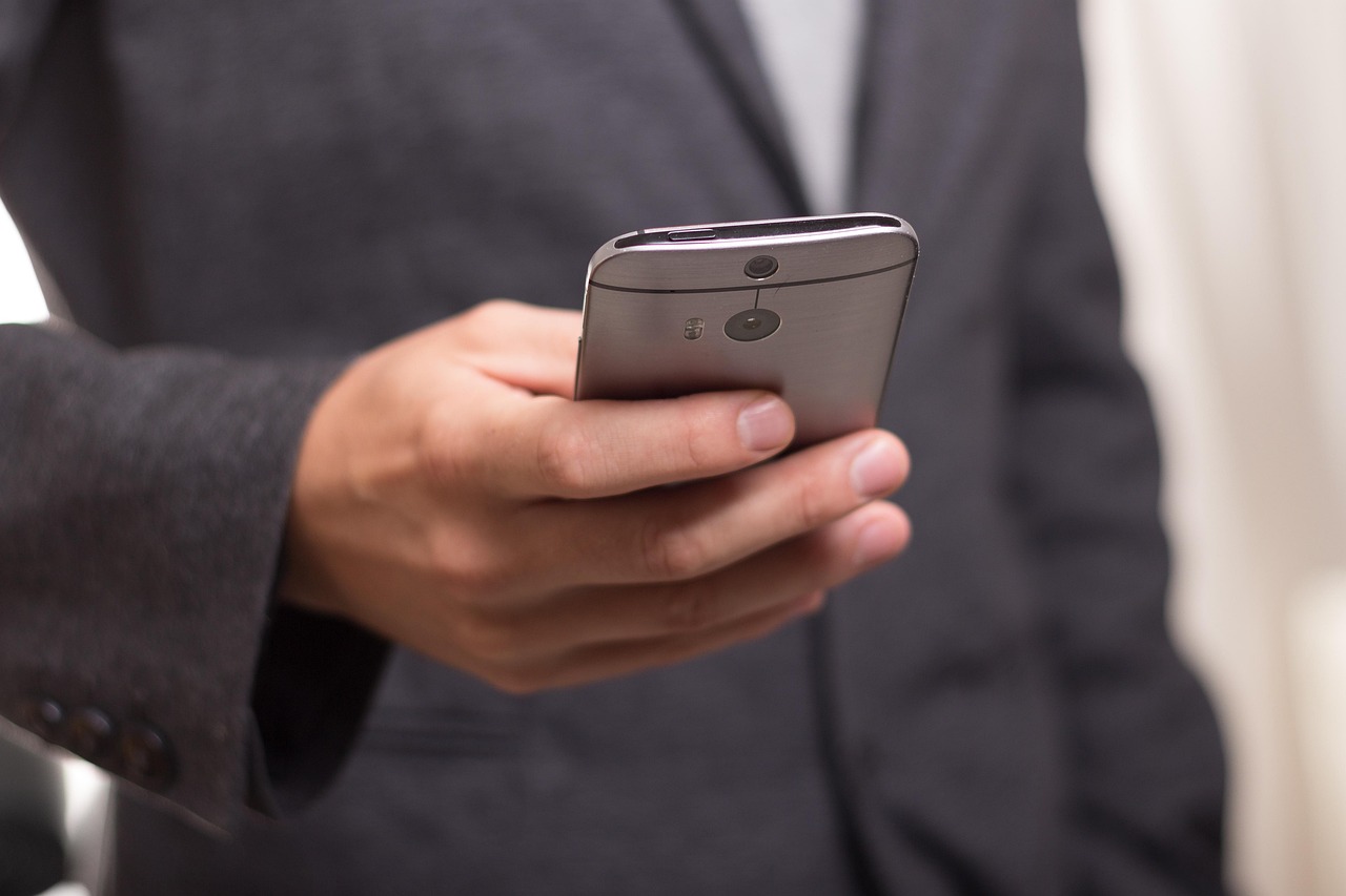 A social-first business owner managing orders from their phone