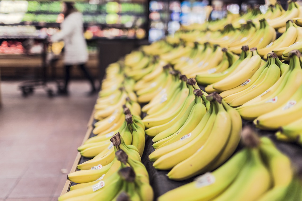 Supermarket cashier scanning items at the checkout
